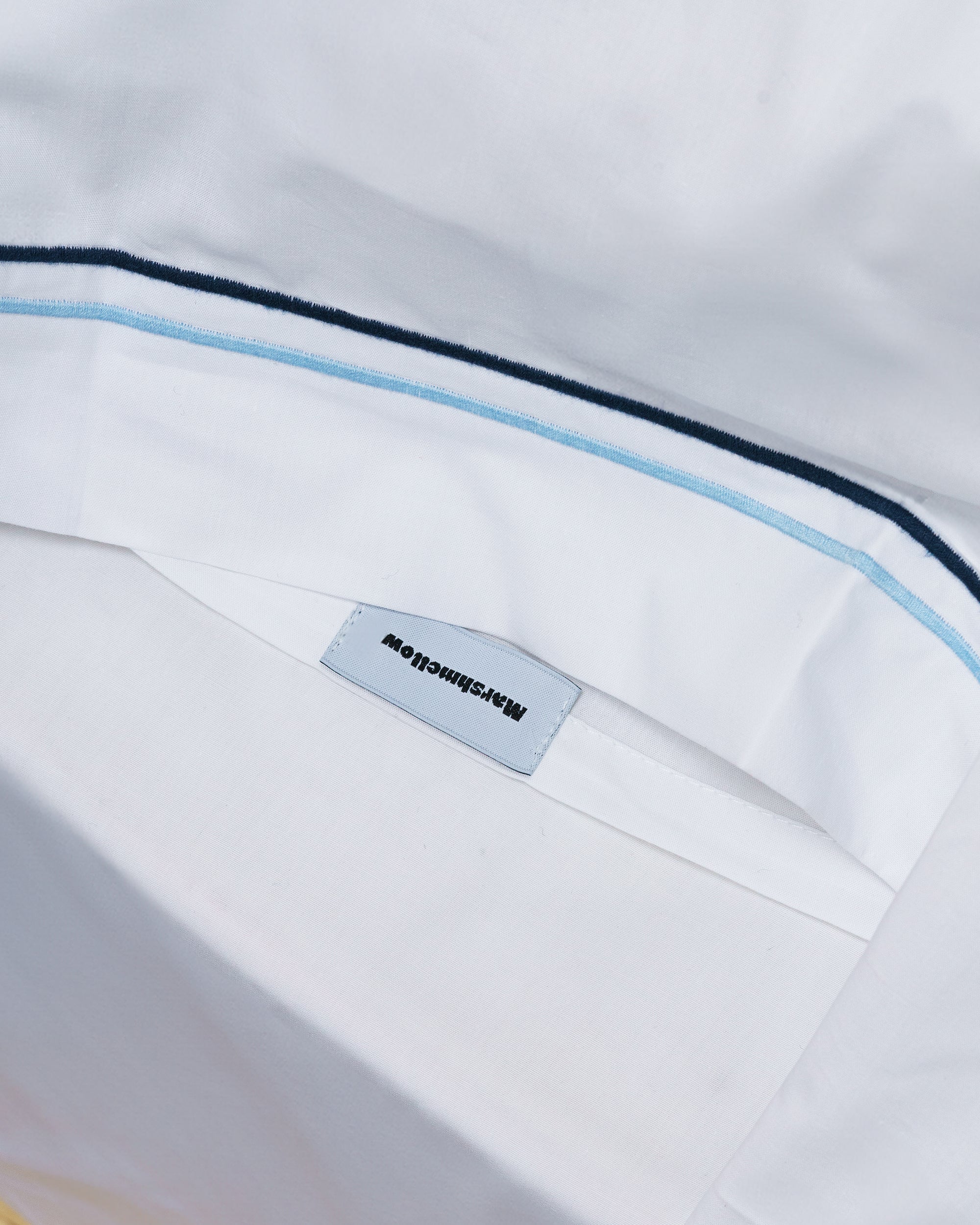 Funda de almohada - percal de 200 hilos (Blanca con rayas azules)