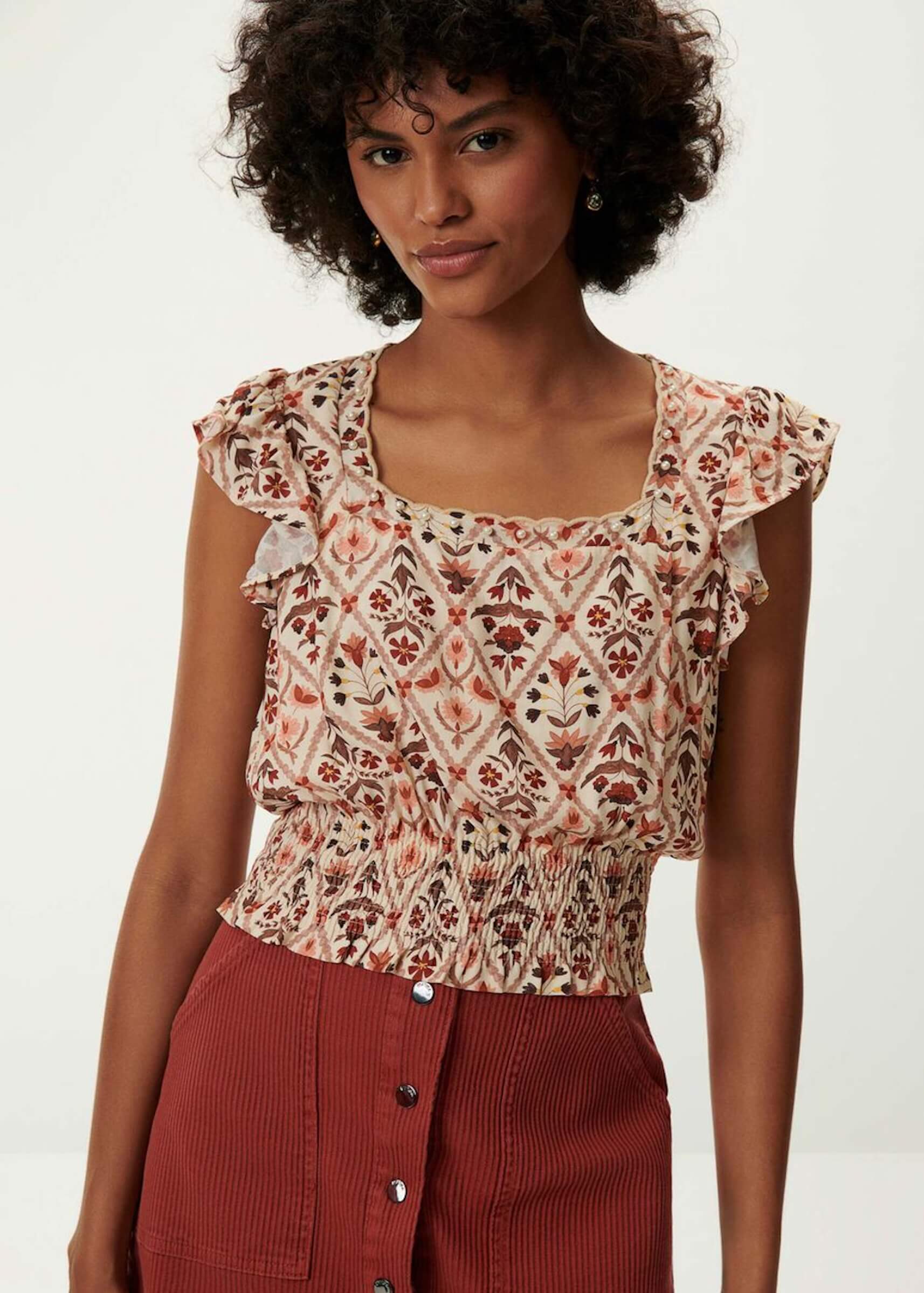 BEDRUCKTE BLUSE MIT PERLEN